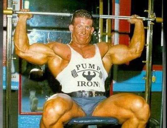 Bodybuilding Dorian yates in his prime doing shoulders on a smith machine